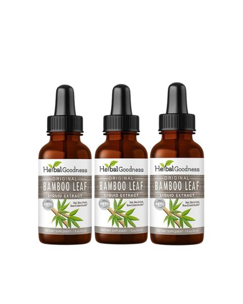 Three amber glass bottles of herbal goodness bamboo leaf extract liquid with black droppers and green bamboo labels