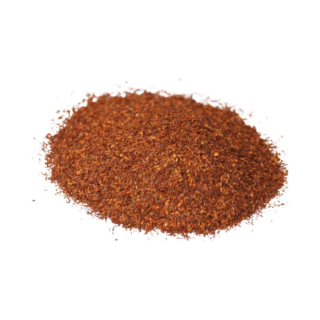 Ground red chili powder in a pile, enhancing herbal goodness for tea history and health